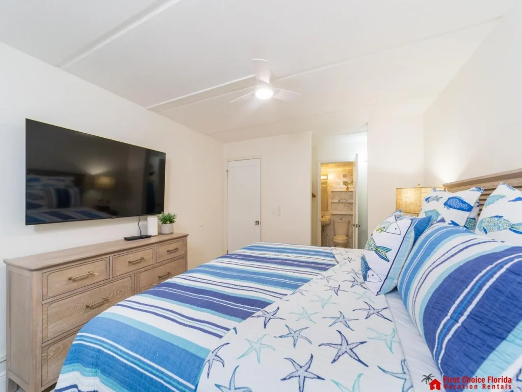 Cozy bedroom retreat with coastal-inspired decor and smart TV!