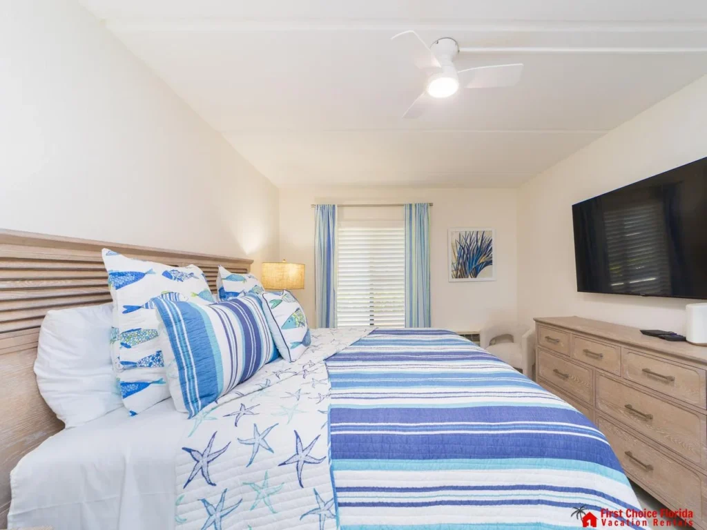 Cozy bedroom retreat with coastal-inspired decor and smart TV!