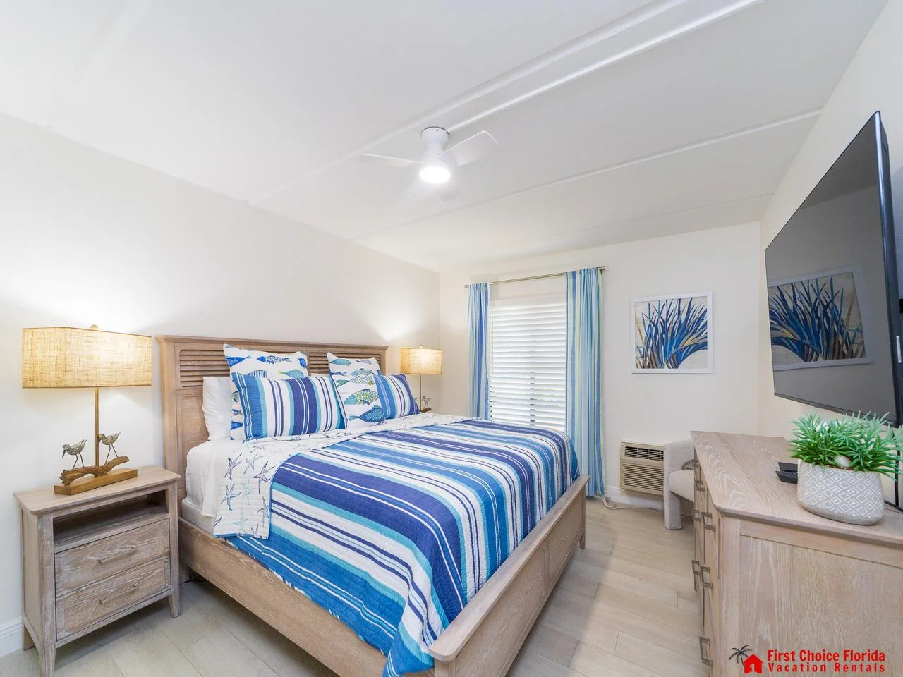 Cozy king bedroom retreat with calming coastal decor and natural light!