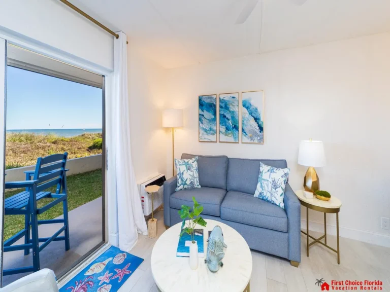 Cozy living room with scenic outdoor ocean views and patio!