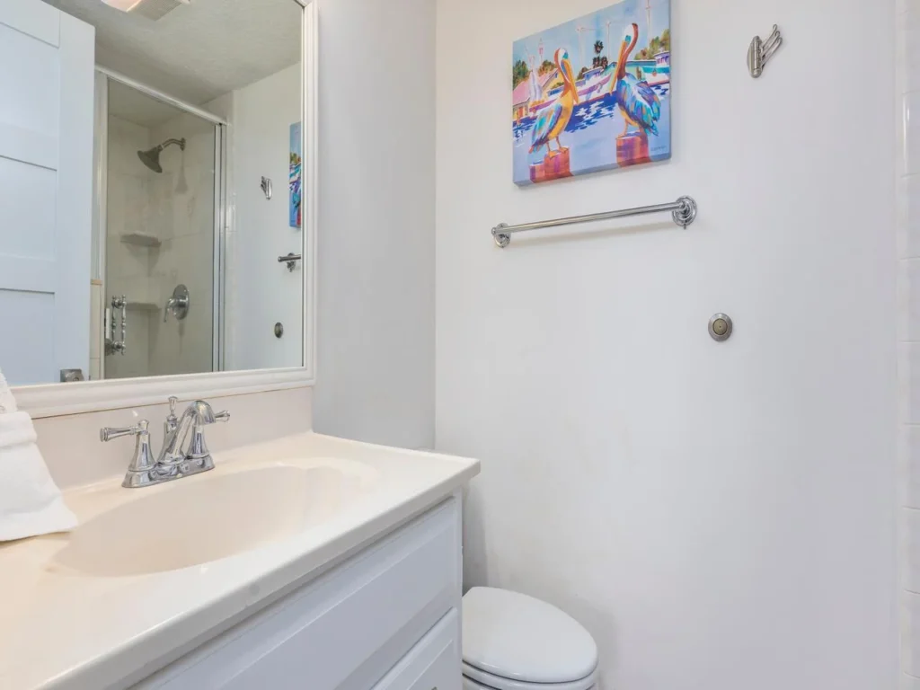 Bright, clean bathroom with modern fixtures and fresh decor