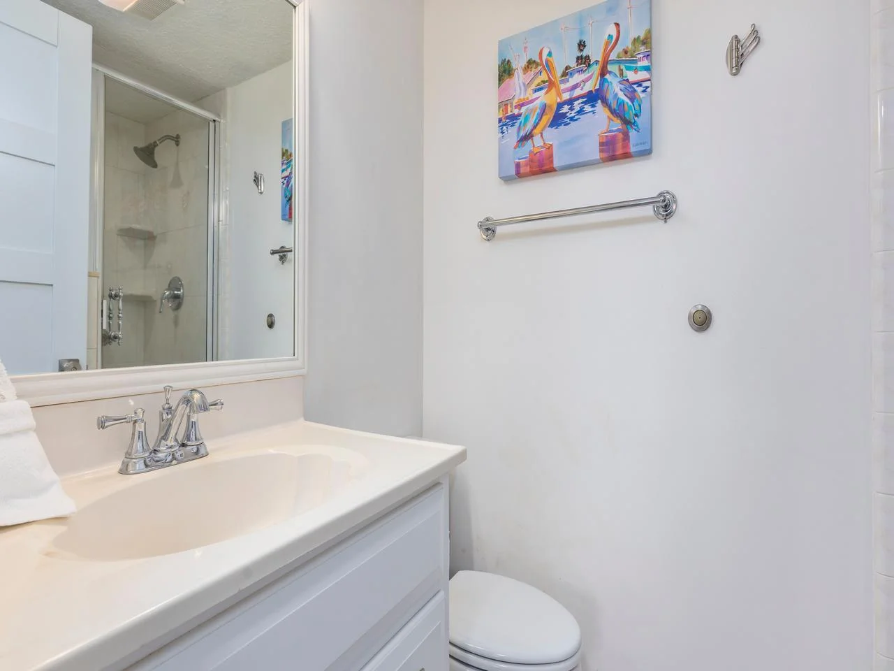 Bright, clean bathroom with modern fixtures and fresh decor