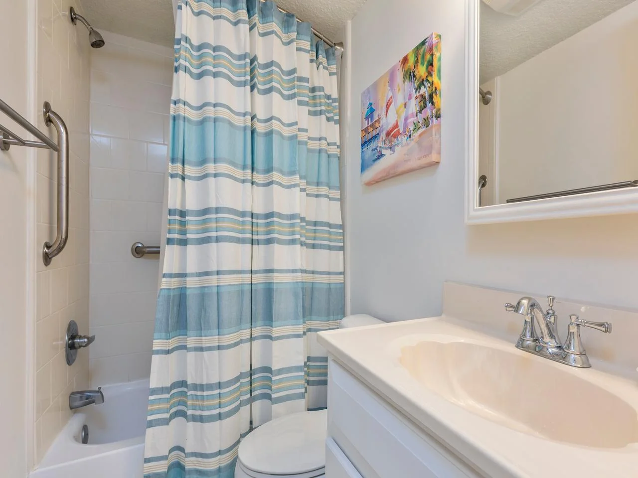 Bright, clean guest bathroom with refreshing coastal accents!