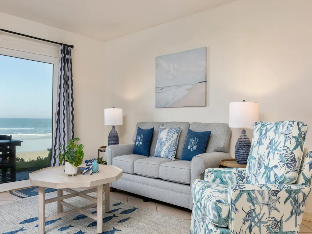 Bright living room with ocean views and cozy seating!
