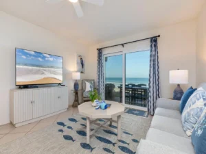 Bright living room with ocean views and cozy seating!