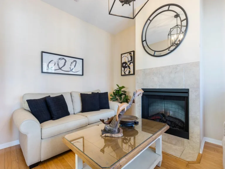 Cozy den with fireplace and stylish decor!
