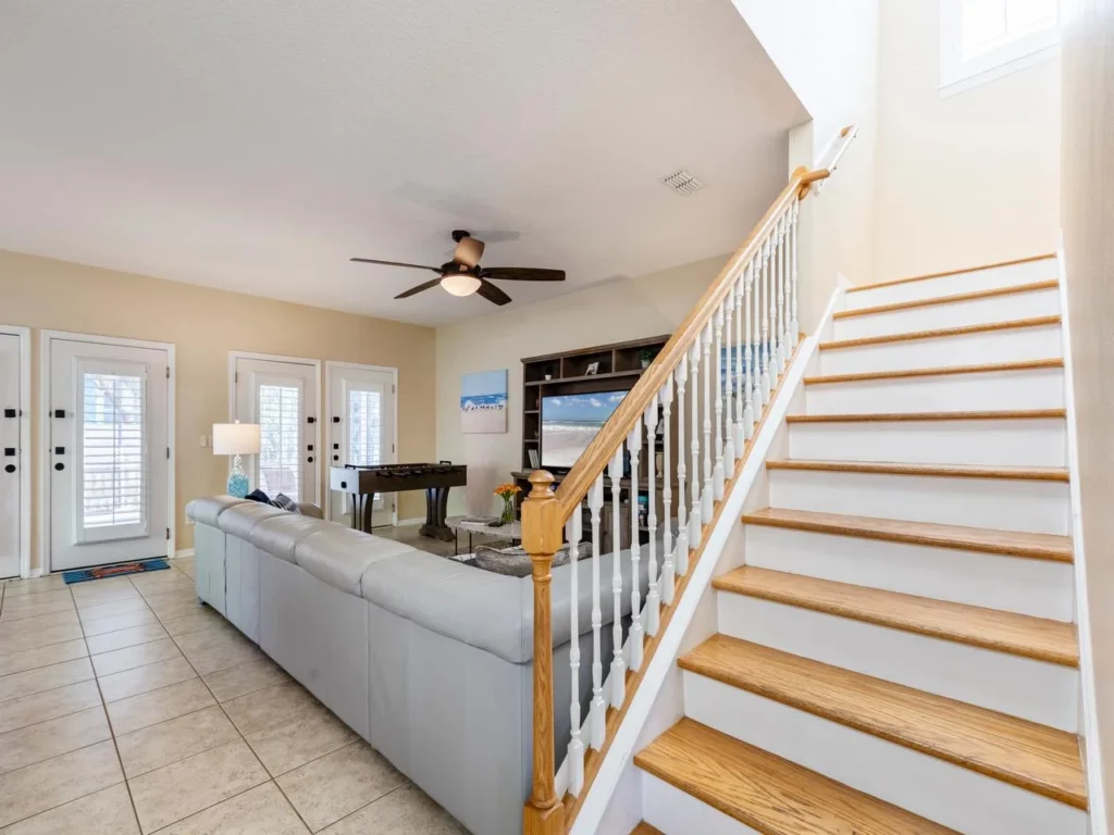 Spacious family room with cozy seating and natural light!