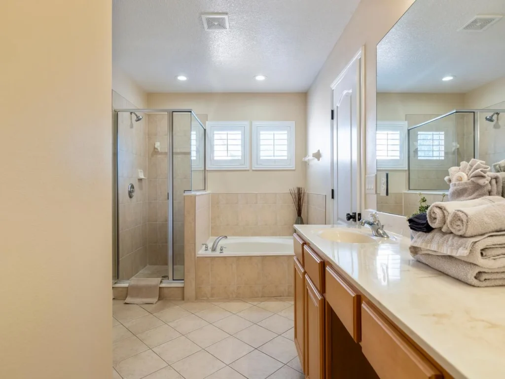 Bright primary bathroom retreat with spacious vanity and soaking tub!