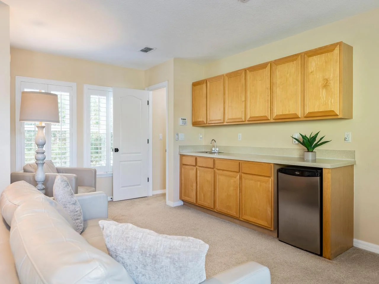 Cozy guest bedroom with wet bar!