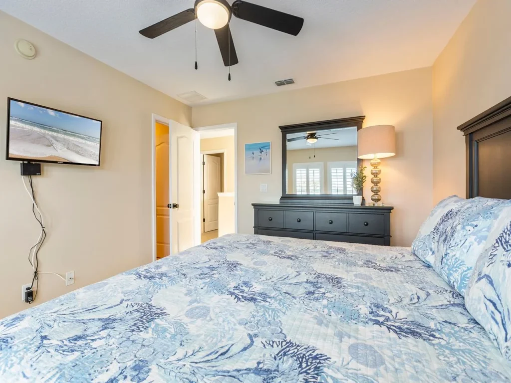 Cozy bedroom retreat with smart tv and natural light!