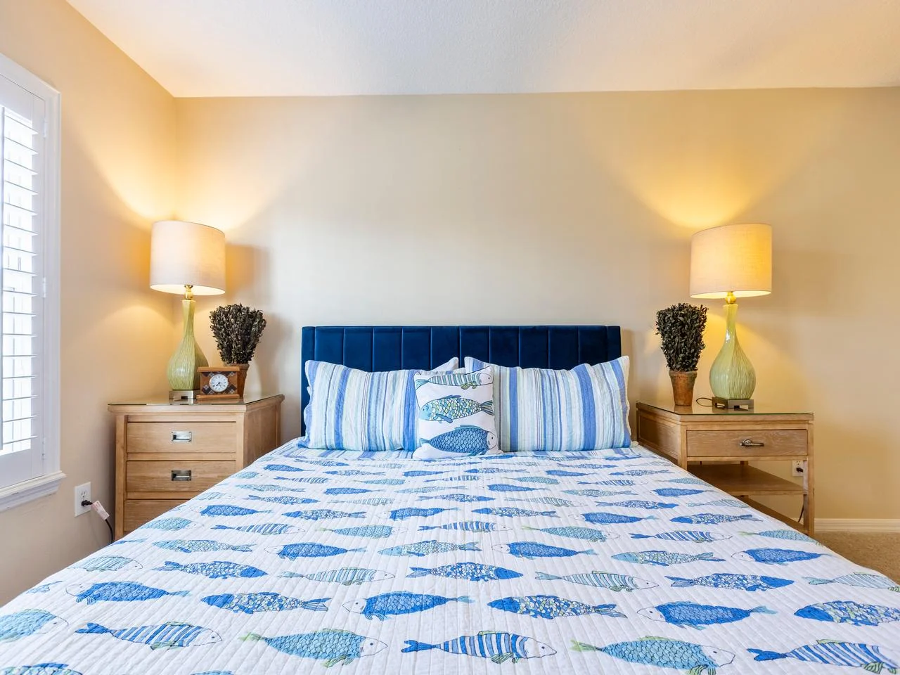 Cozy king bedroom retreat with soft lighting and charming decor!