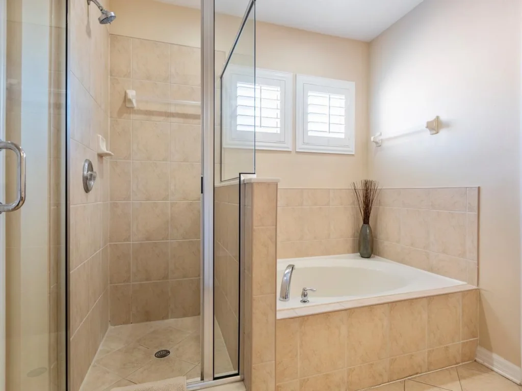 Spa-like bathroom with separate glass shower and soaking tub!