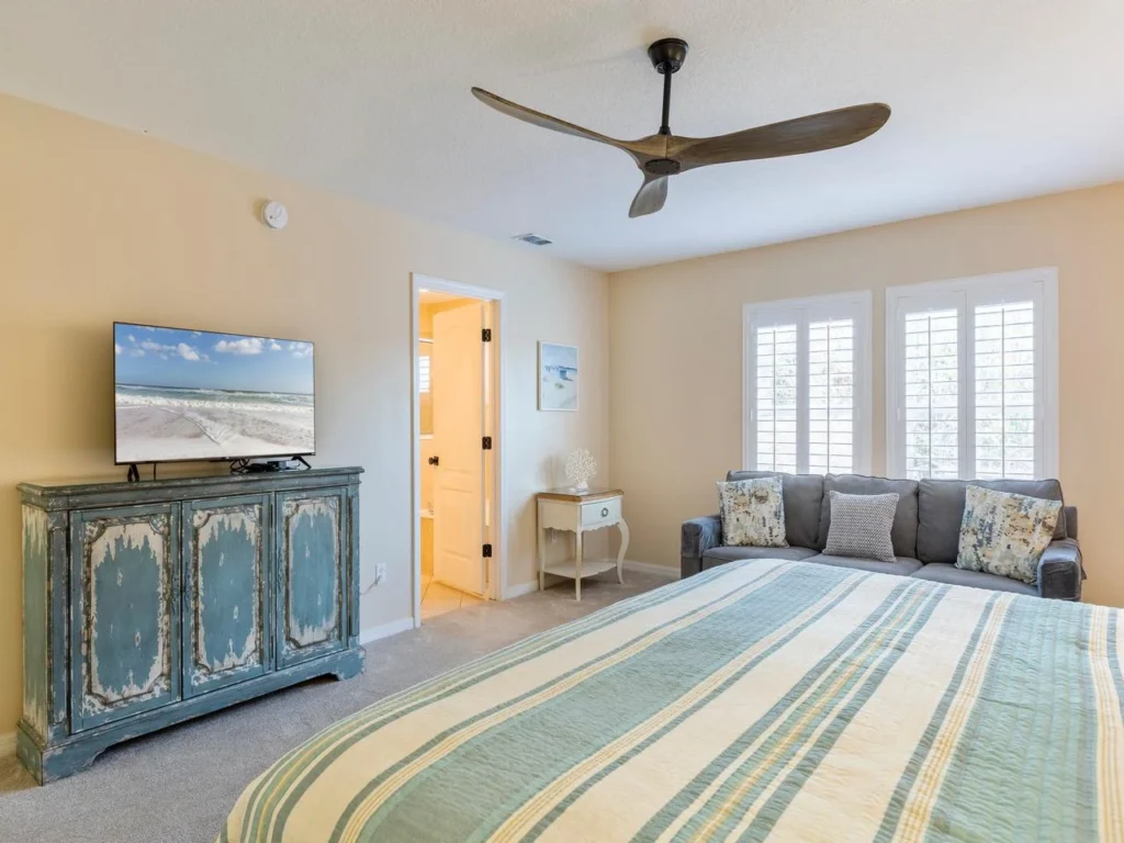 Bright and airy primary bedroom with king bed and a queen sofa sleeper!