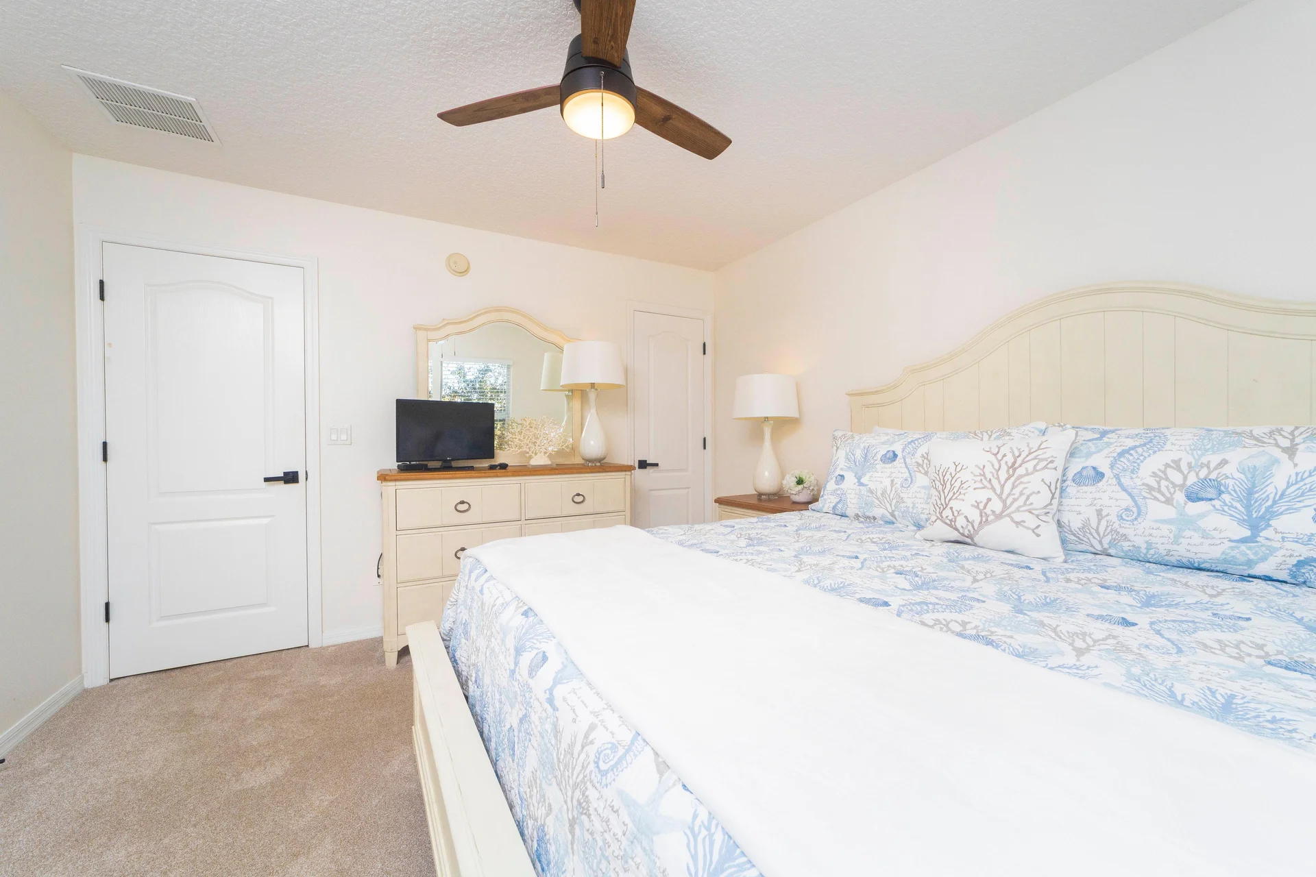 Primary Bedroom with King Bed and TV