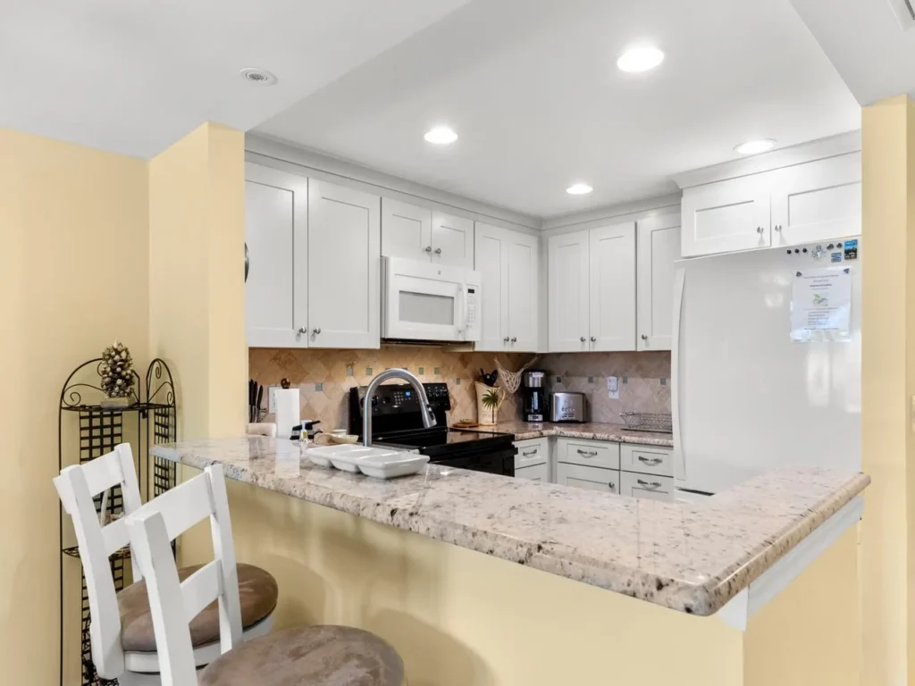 Bright, modern kitchen with spacious granite countertops