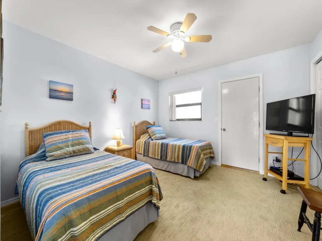 Cozy twin guest bedroom with bright, airy comfort and modern touches!