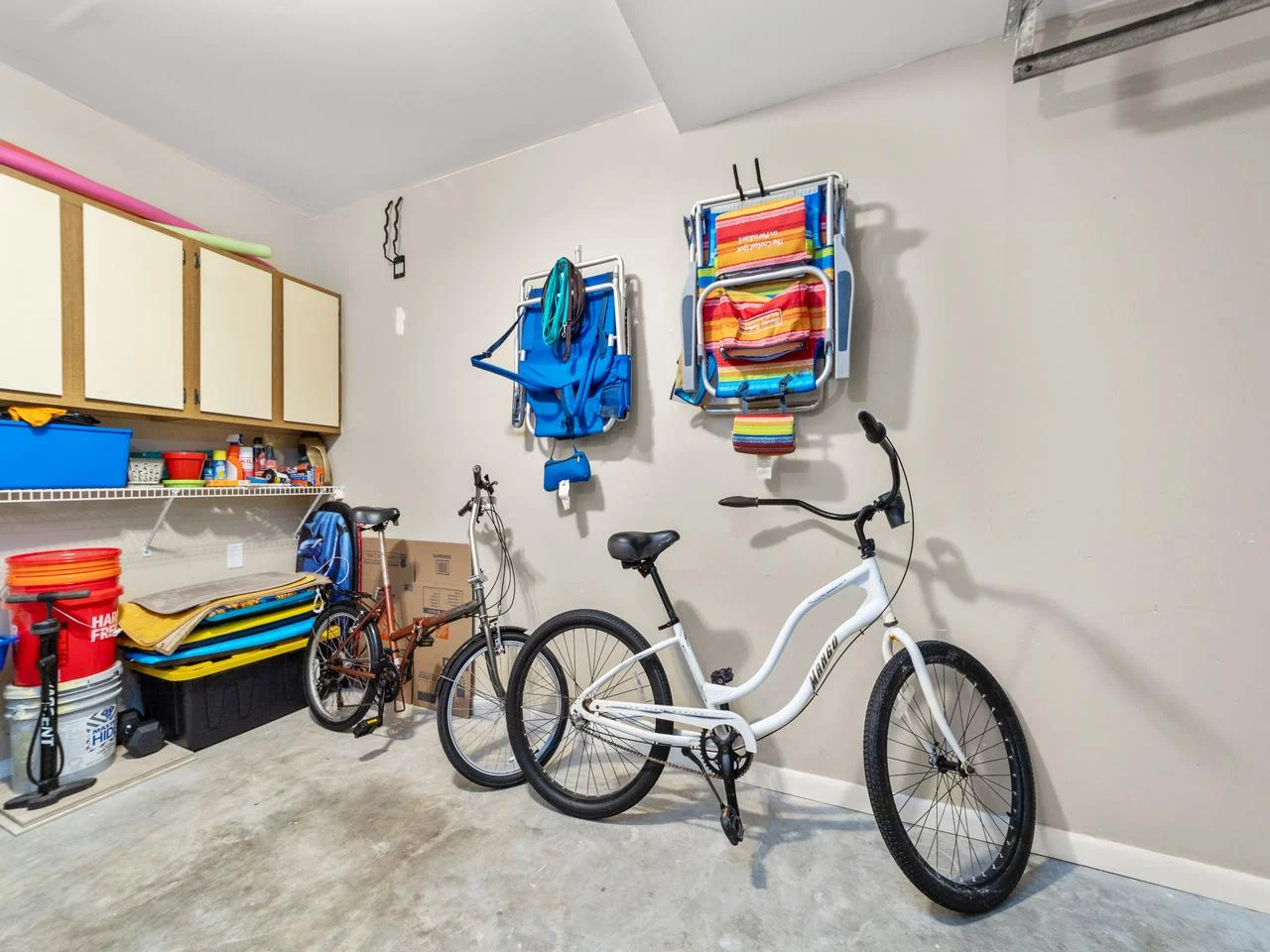 Organized garage with bike and beach gear storage!