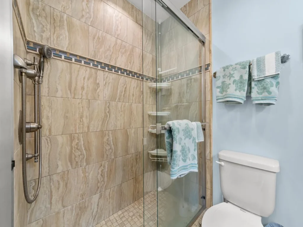 Spa-inspired bathroom with glass shower and modern fixtures