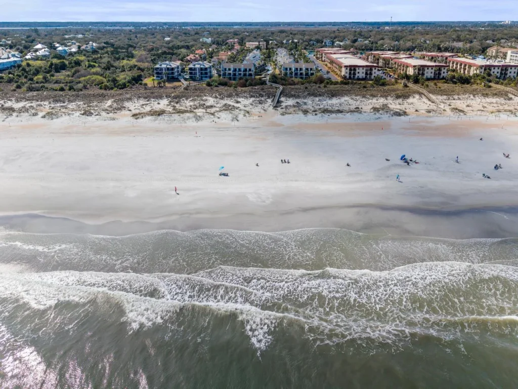 Sprawling beachfront with endless ocean views and soft sand