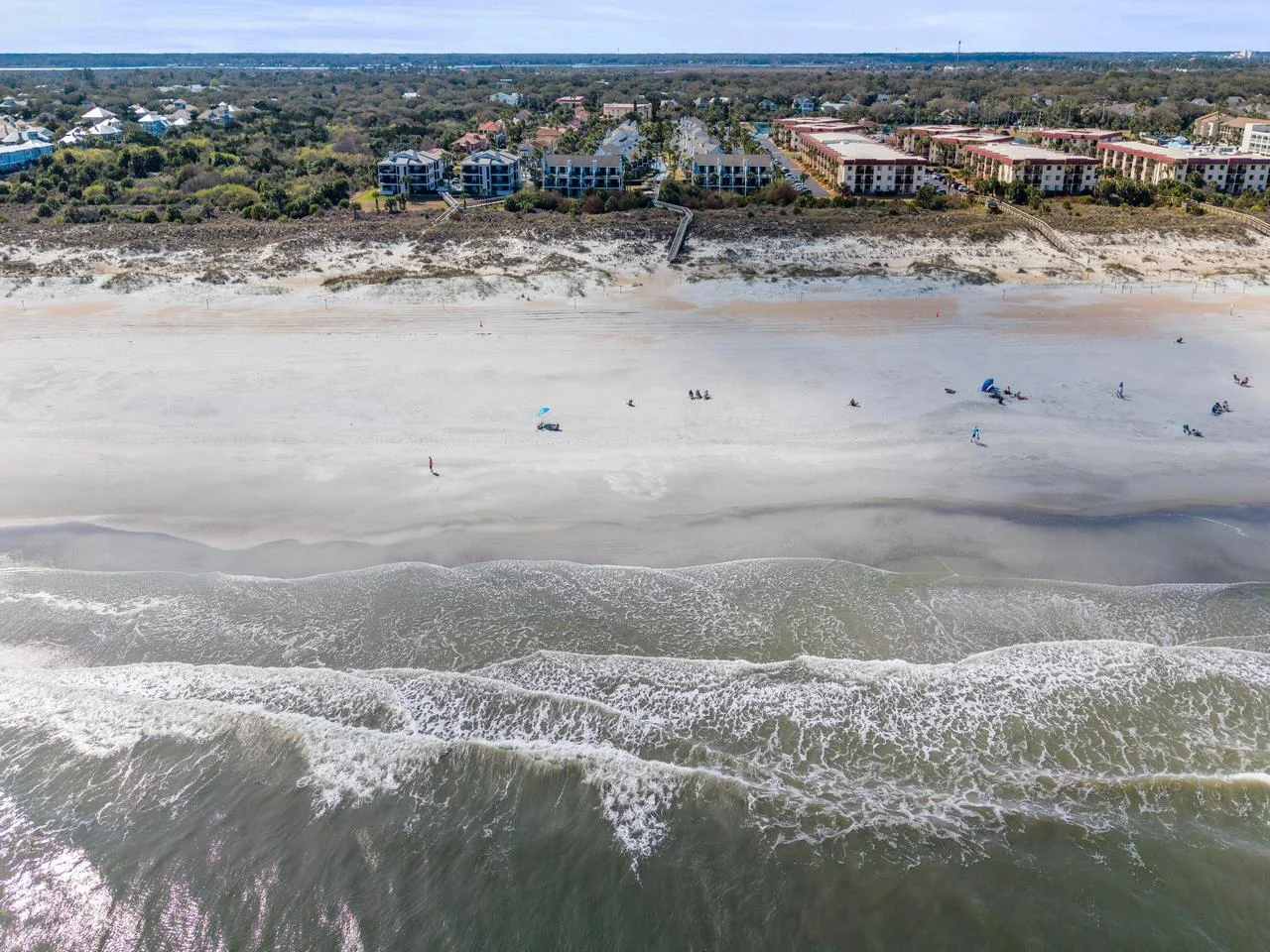 Sprawling beachfront with endless ocean views and soft sand