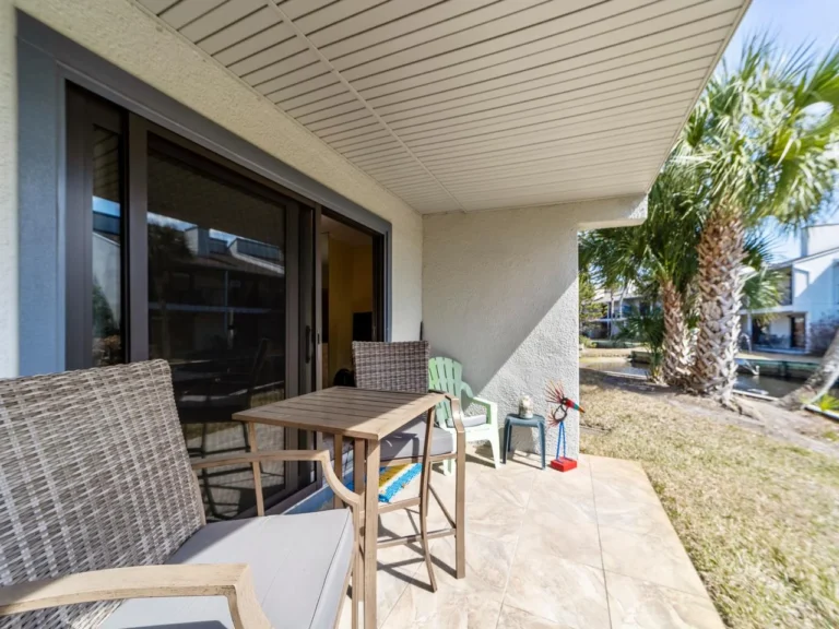 Cozy covered patio with dining and lounge seating