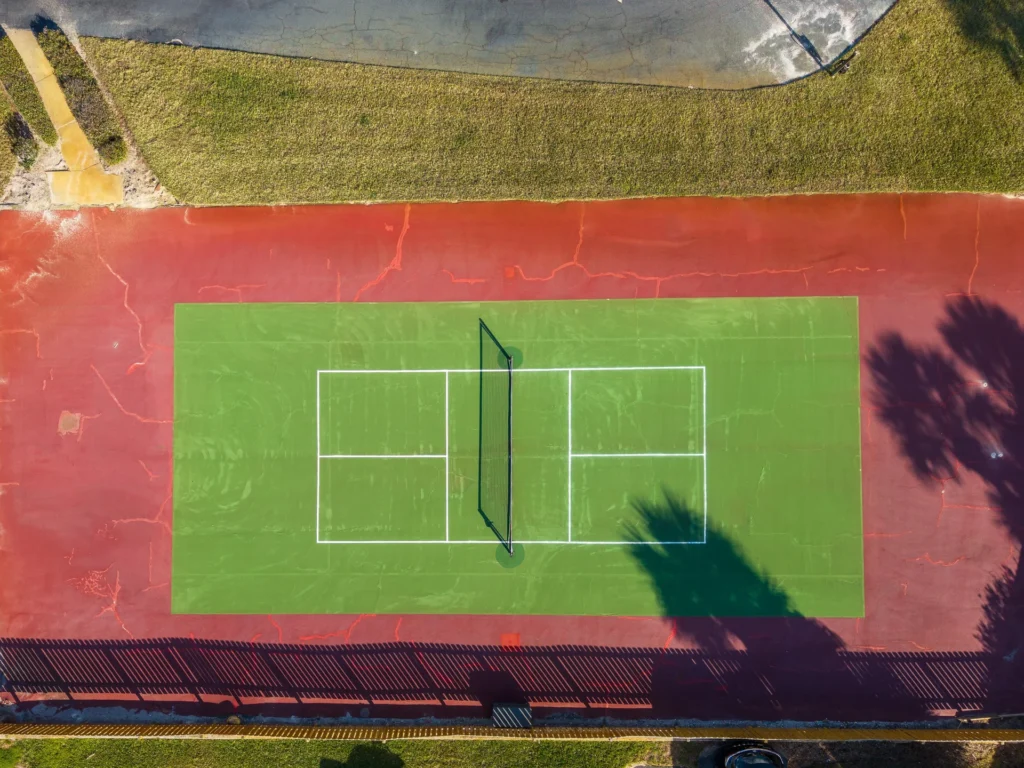 Vibrant outdoor tennis court for active, sunny days