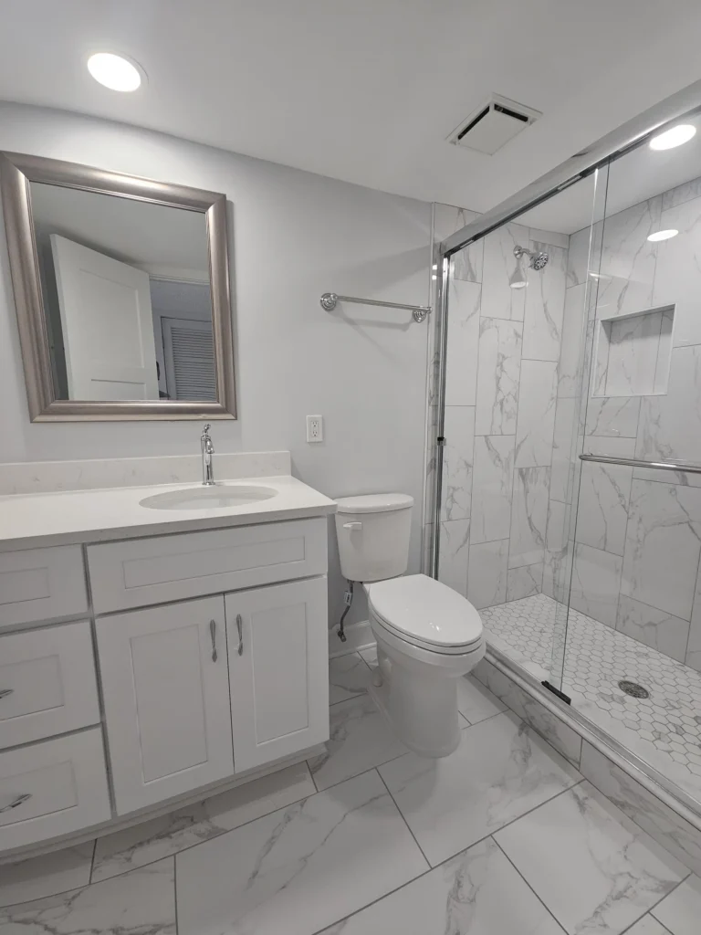 Modern guest bathroom with sleek glass shower