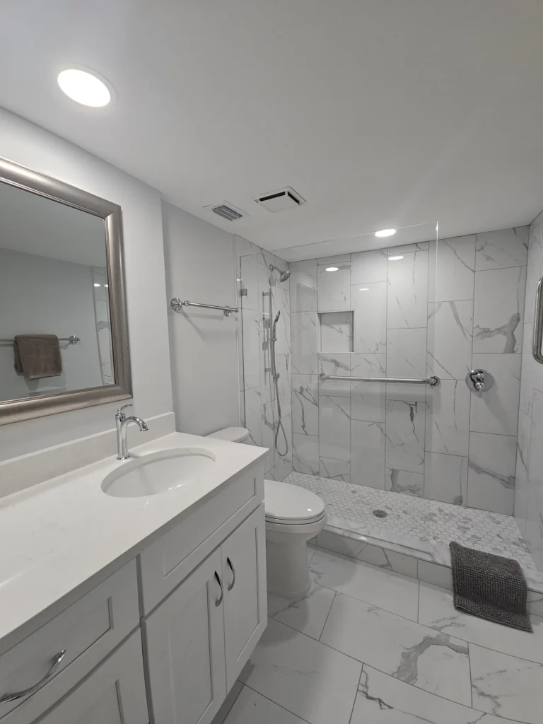 Bright, modern primary bathroom with a spacious shower