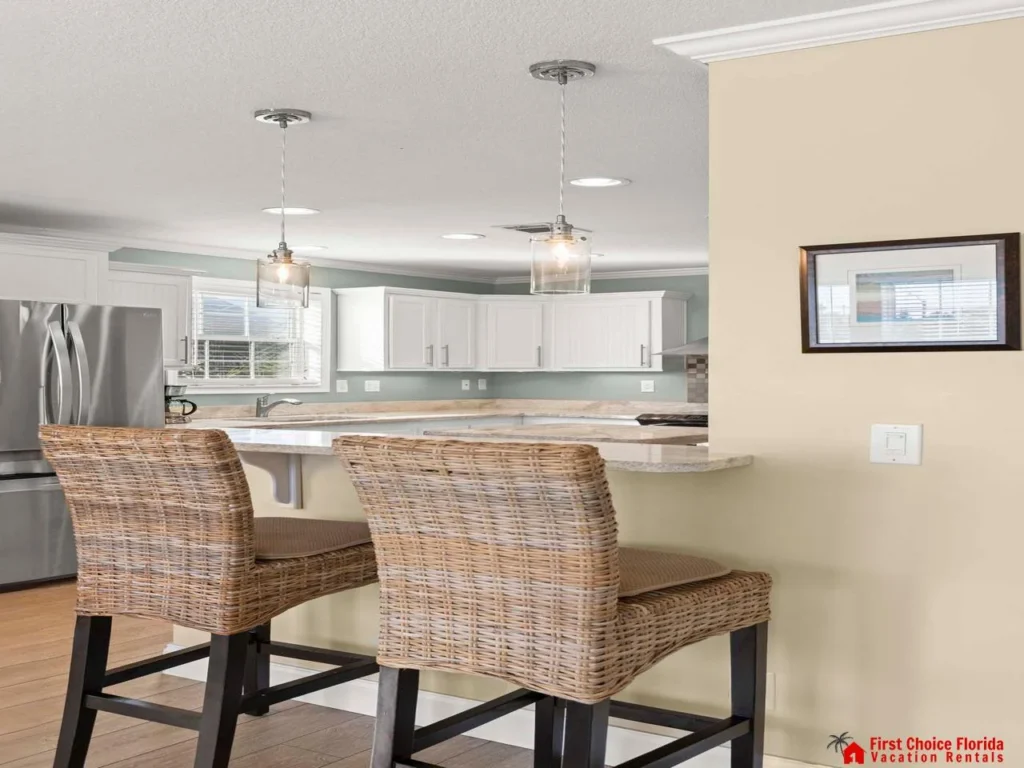 Bright, open kitchen with cozy breakfast bar seating
