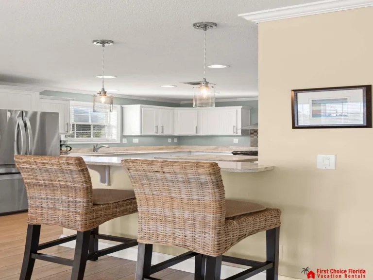 Bright, open kitchen with cozy breakfast bar seating