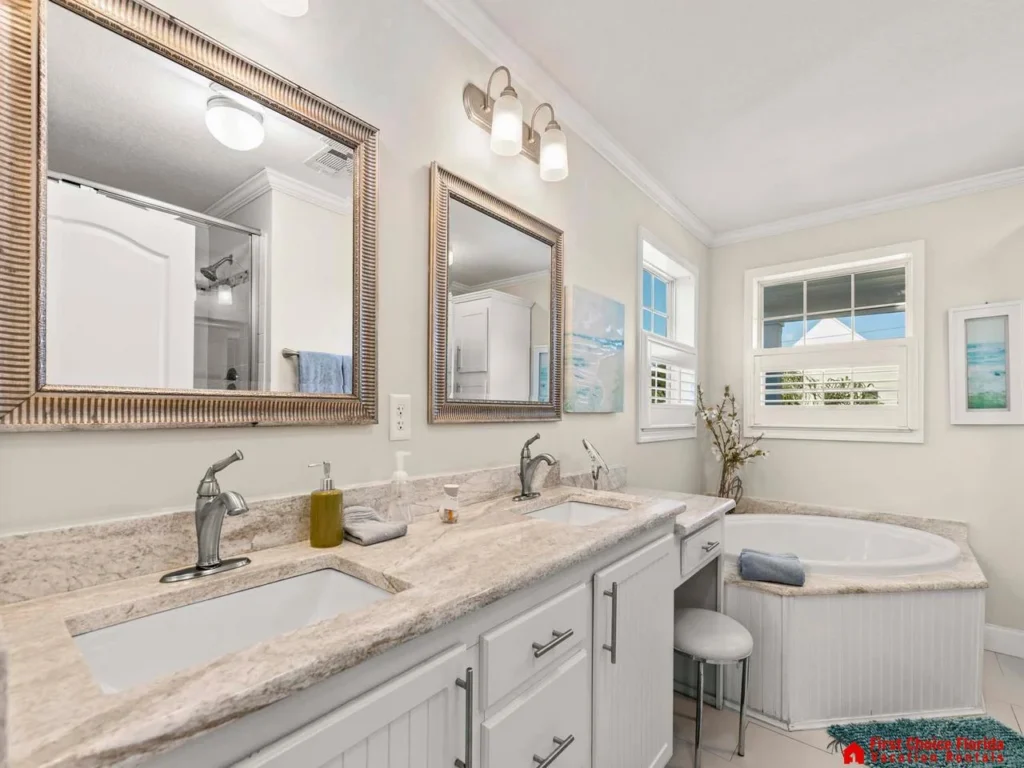 Bright and airy bathroom with dual sinks and natural light