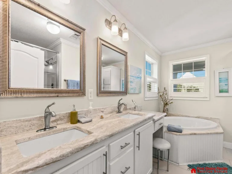 Bright and airy bathroom with dual sinks and natural light