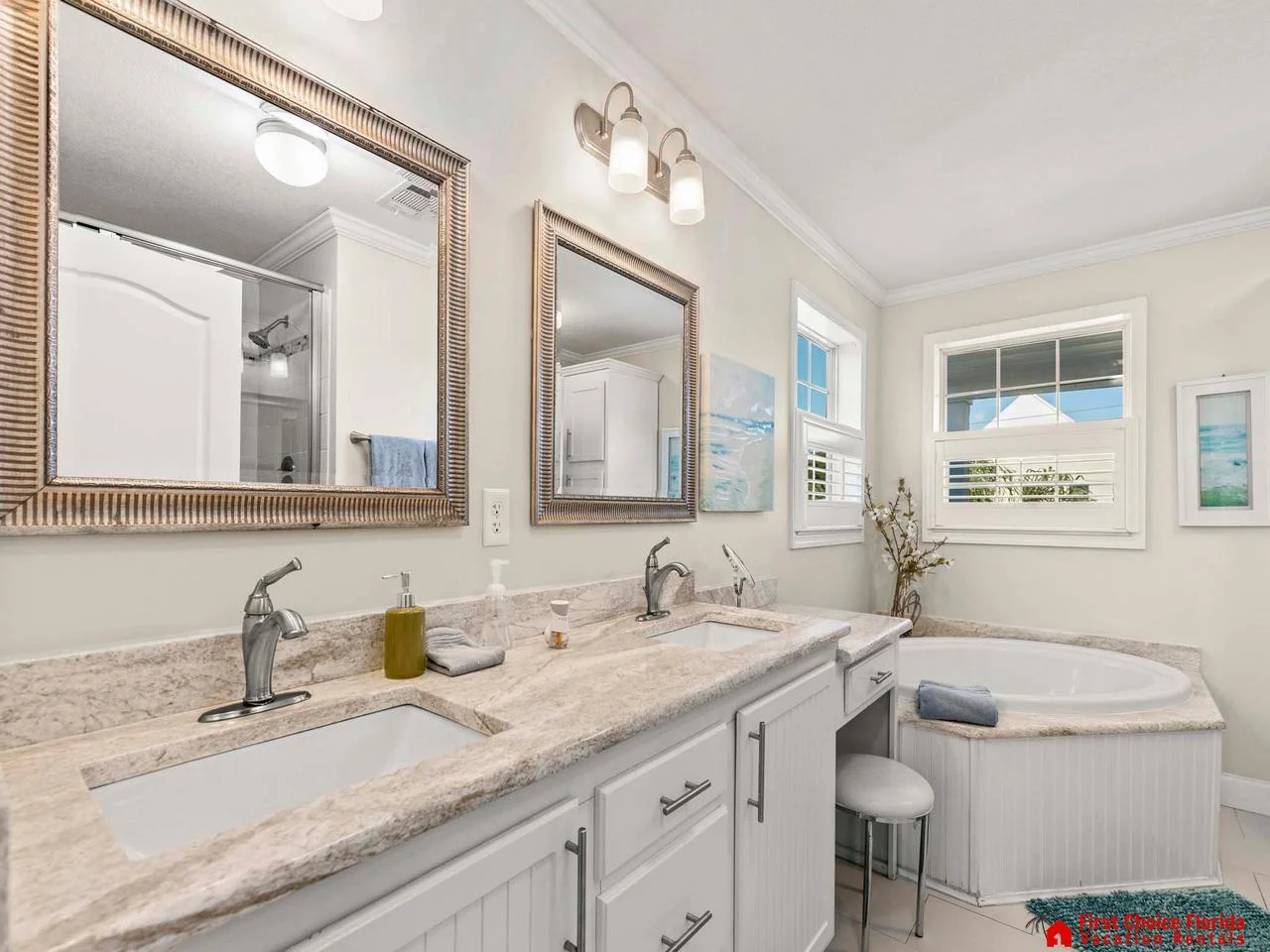 Bright and airy bathroom with dual sinks and natural light