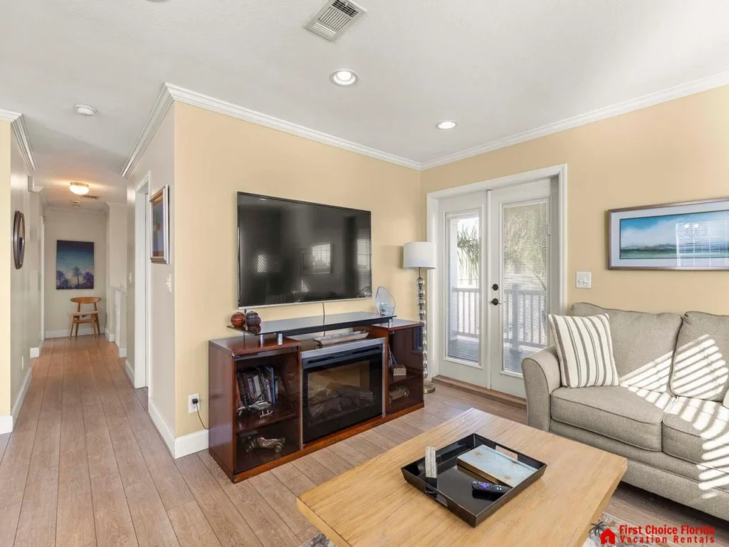 Cozy living room with smart TV and garden access