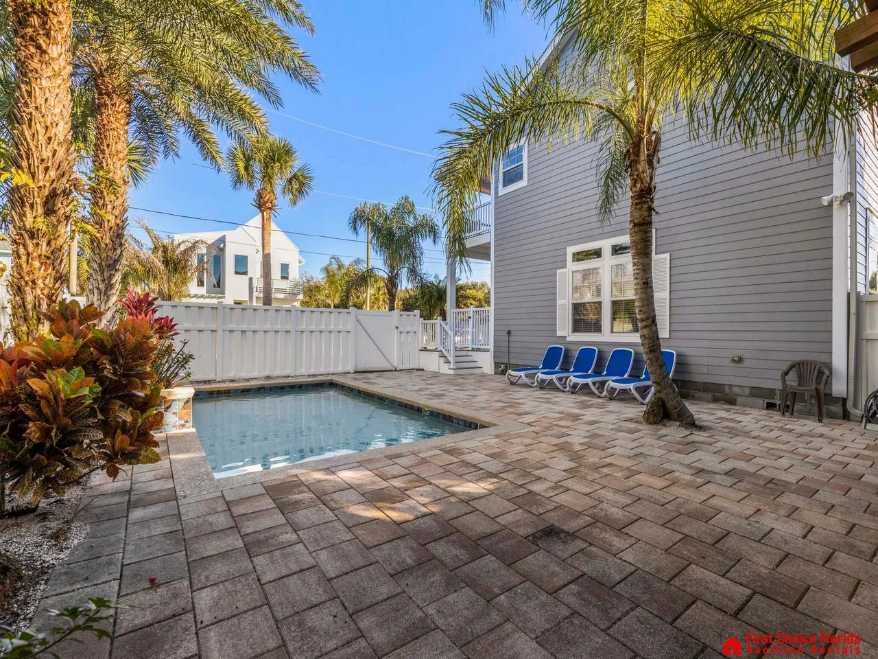 Private pool oasis with spacious sunlit patio area