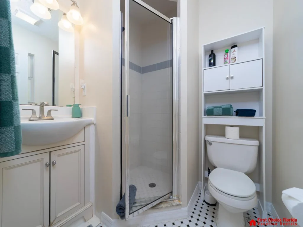Cozy bathroom with bright lighting and classic tile flooring