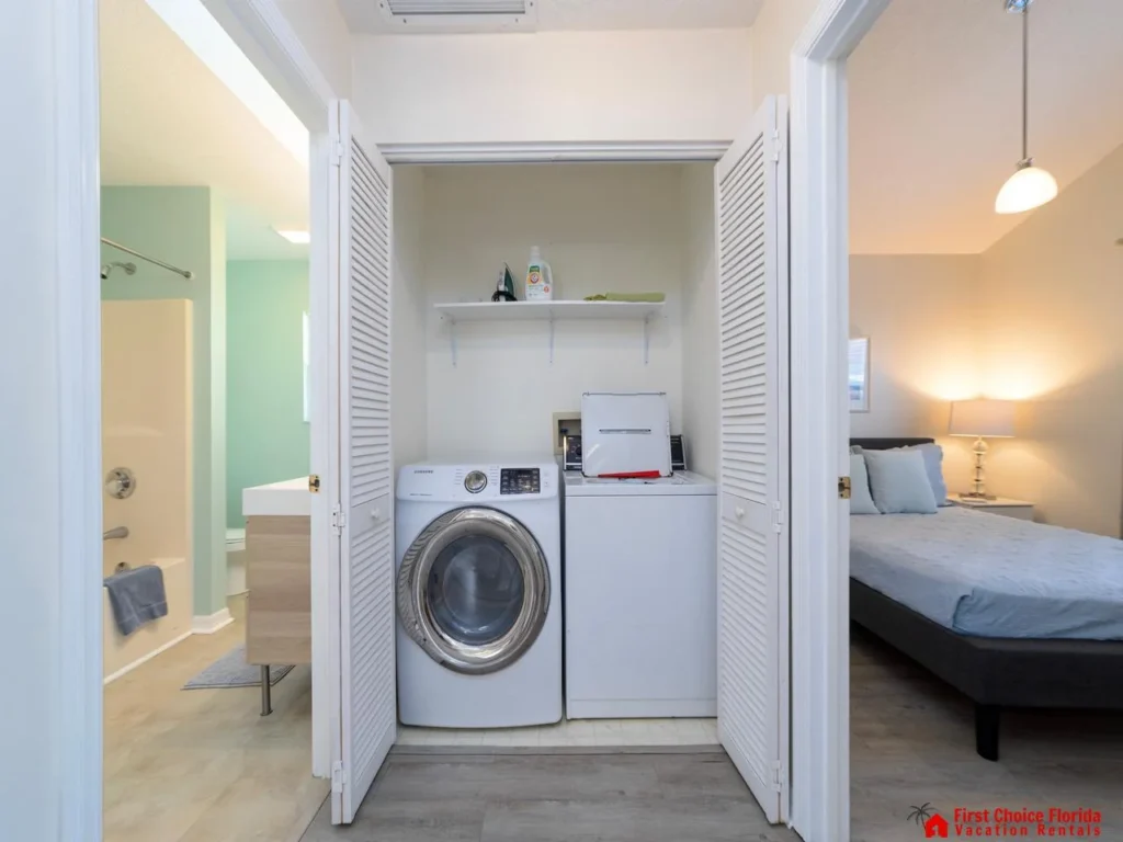 Convenient laundry nook steps from cozy bedroom and bath