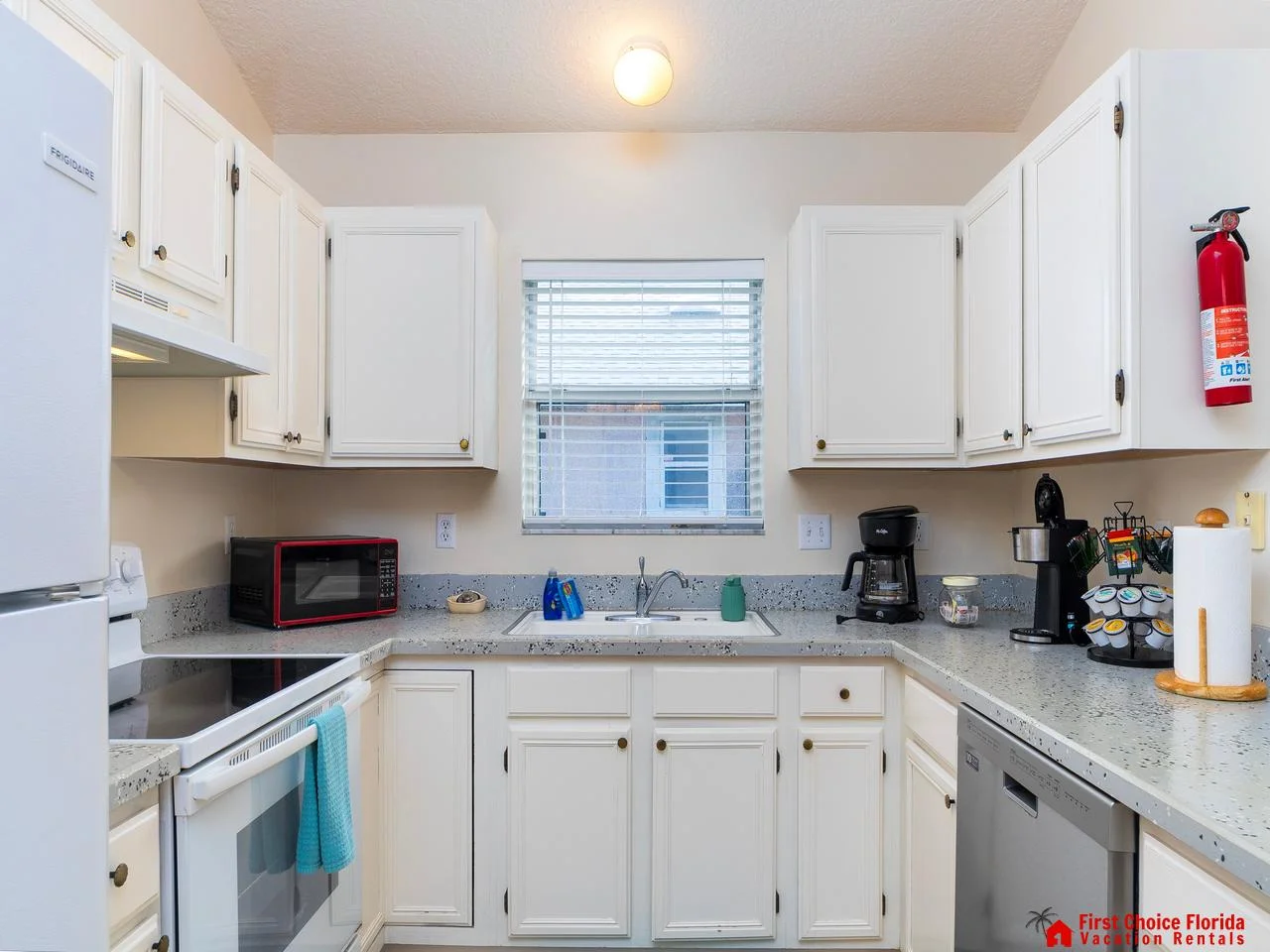 Bright, cozy kitchen with modern appliances and ample storage
