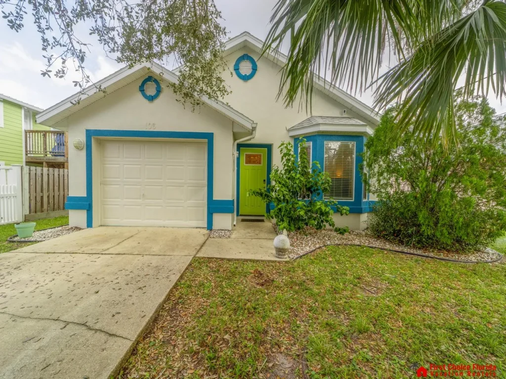 Charming home with vibrant accents and only one short block to the beach!