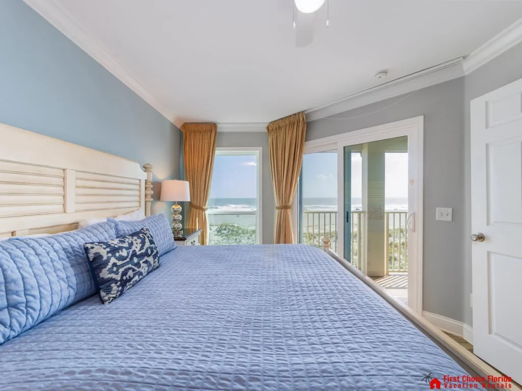 Cozy bedroom with ocean views and natural light