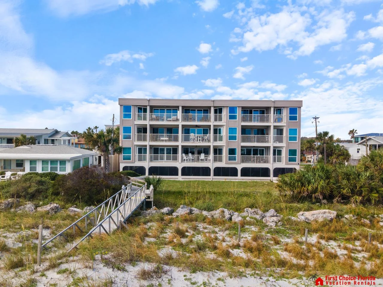 Spacious beachfront condo with panoramic ocean views and private boardwalk access