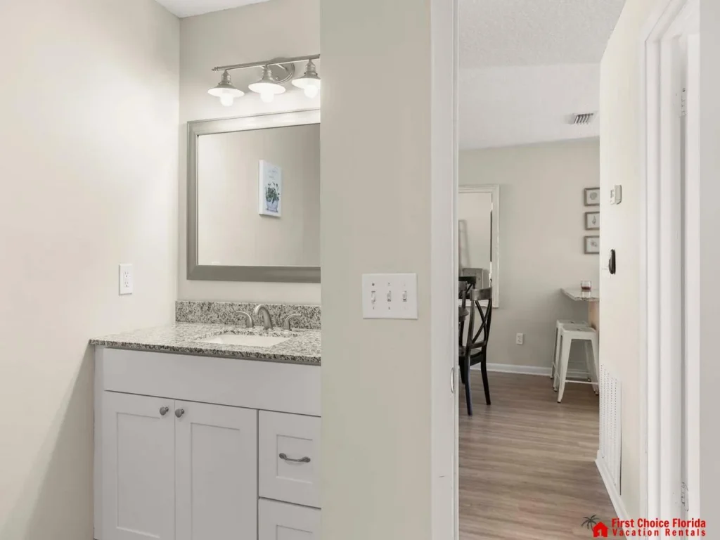 Bright bathroom with modern vanity and granite countertop