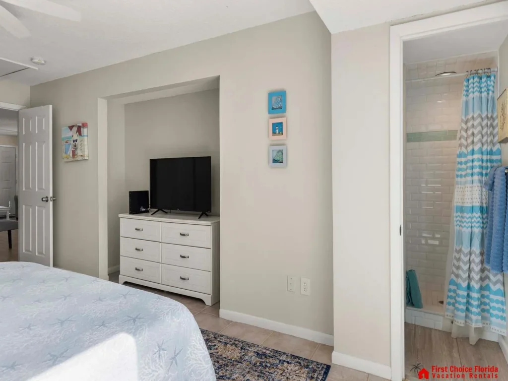 Cozy bedroom retreat with smart TV and calming decor