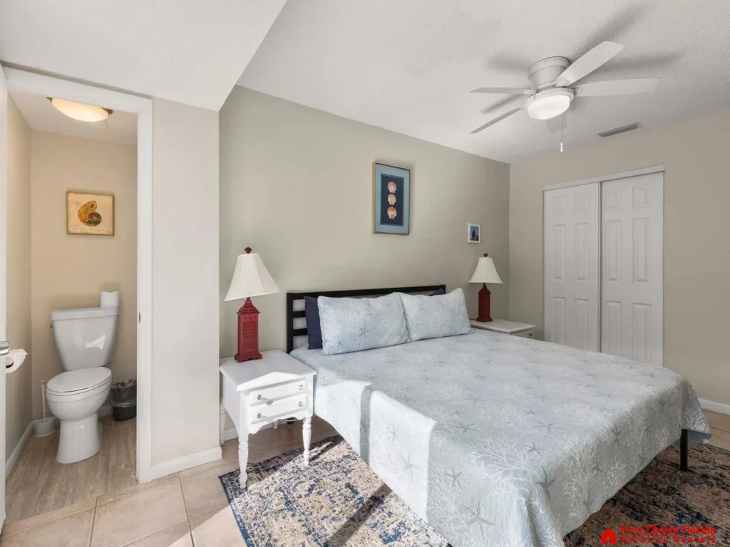 Cozy bedroom retreat with ensuite bathroom and natural light