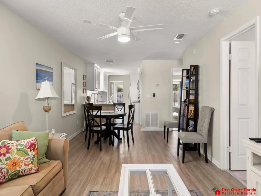 Bright and airy living and dining area with cozy seating