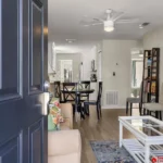 Bright and airy living room with cozy seating and dining area