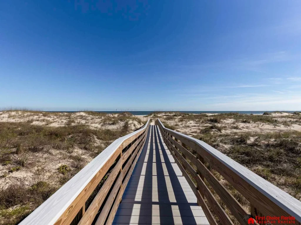 Scenic boardwalk leading to tranquil beach escape