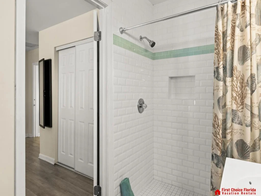 Bright, airy bathroom with modern walk-in shower and natural light