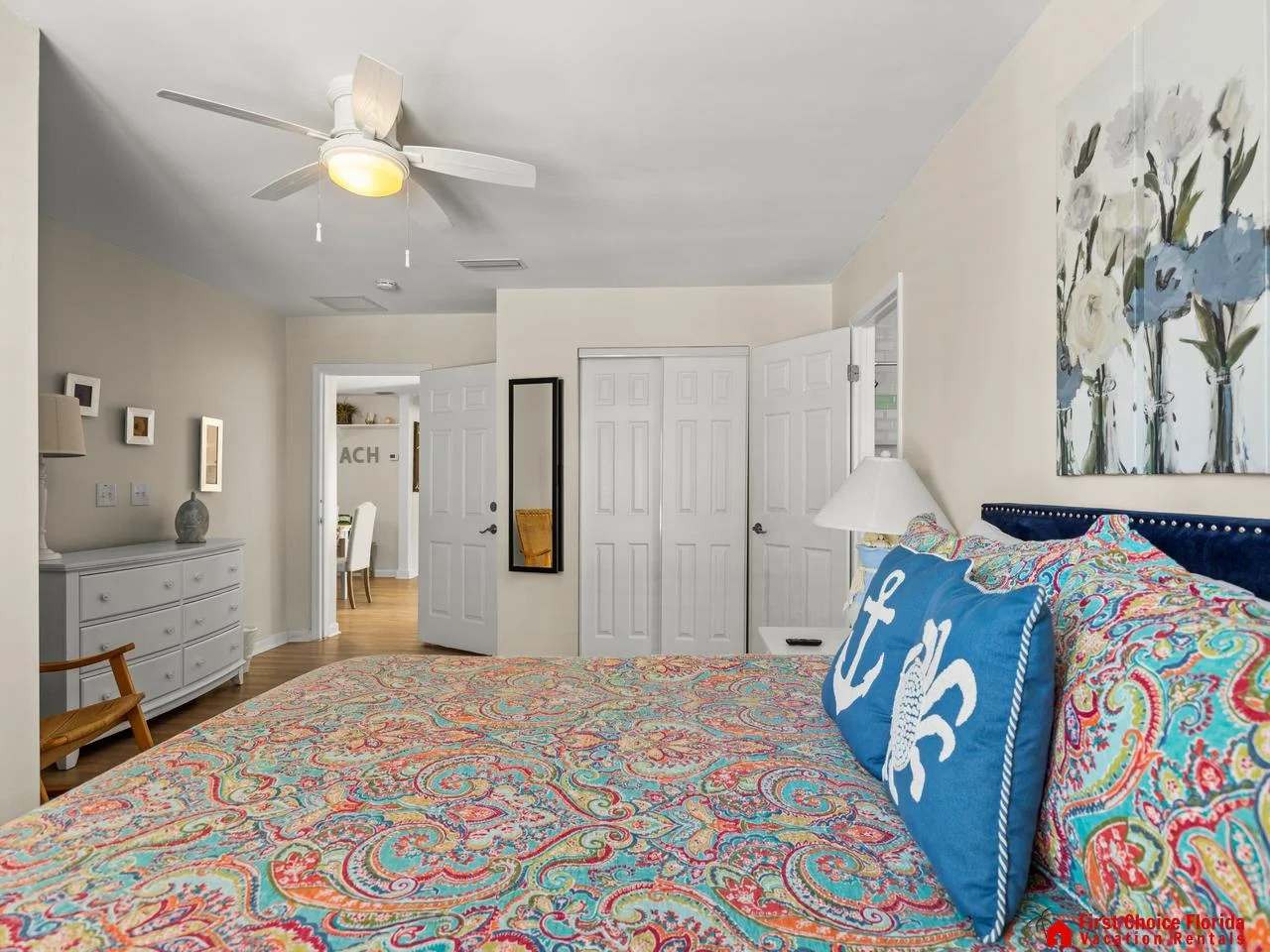 Bright and airy bedroom with cozy, colorful accents