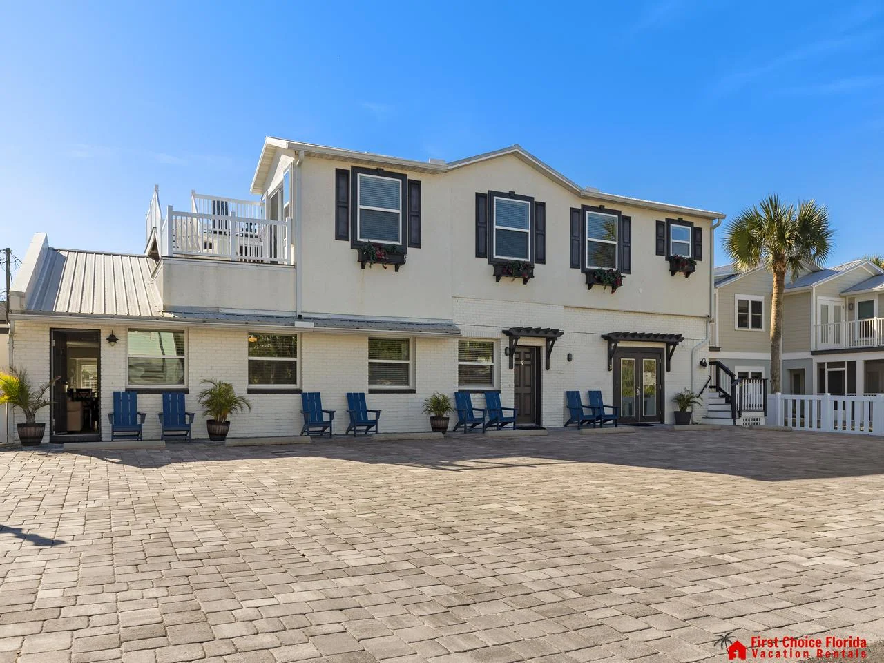 Spacious beachfront patio with stunning ocean views and cozy seating